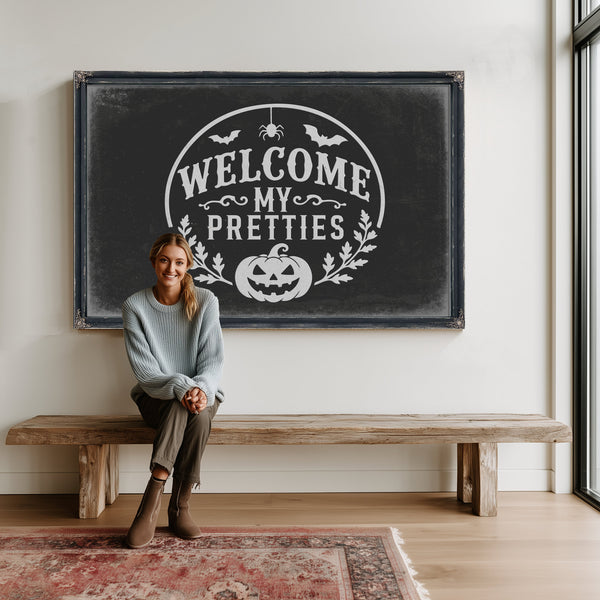 Welcome My Pretties Sign Halloween wall art in a styled room
