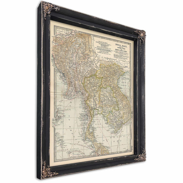 a framed map of asia in a black frame