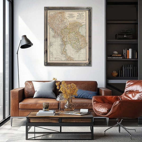 a living room with a couch, chair and a map on the wall