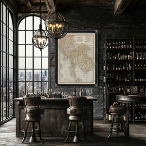 a bar with two stools and a map on the wall